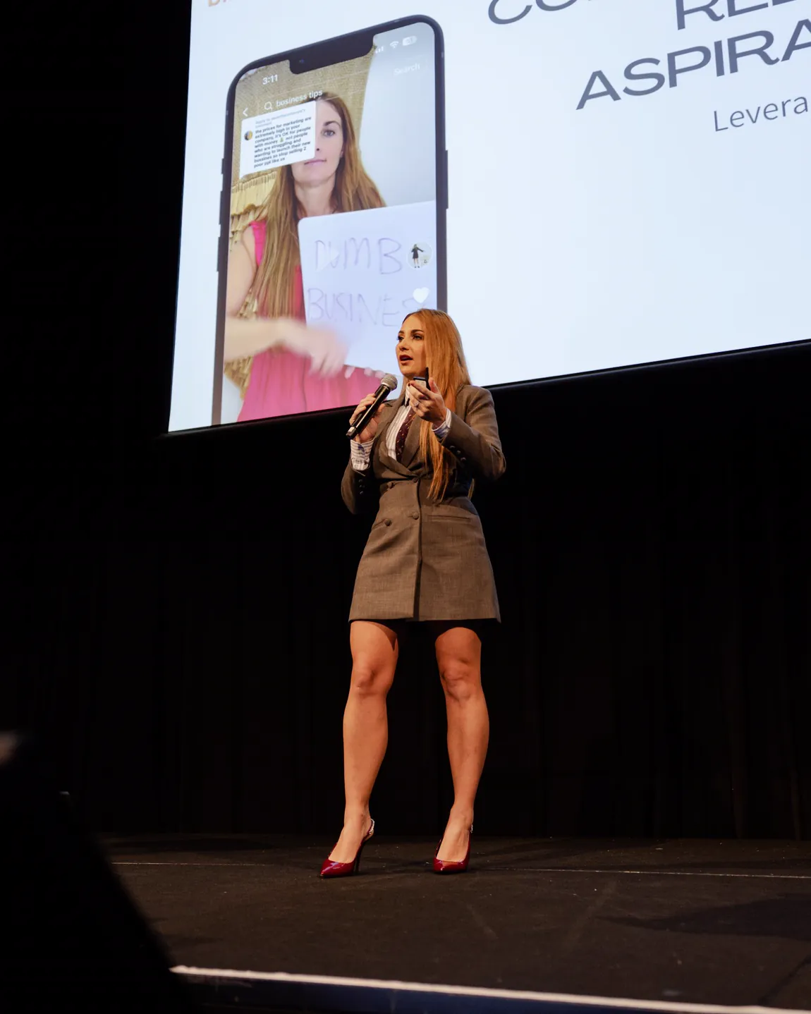 Maddy speaking to a full room